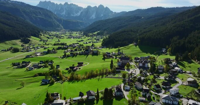 Beatiful aerial landscape of Gosau Municipality in upper Austria, Europe. Town, church, mountains are visible. High quality DJI Mavic 3 Cine prores video footage.