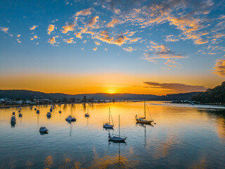 Fototapeta premium Sunrise views over the channel and bay with boats