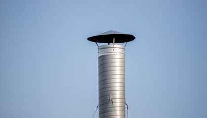 metal pipe, antenna, lamp, against the sky