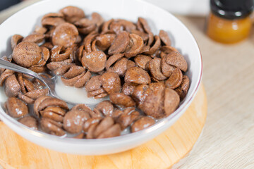 Sweet chocolate breakfast cereal flakes.