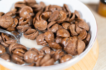 Sweet chocolate breakfast cereal flakes.