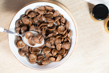 Sweet chocolate breakfast cereal flakes.