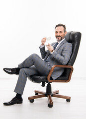 business success. professional leader ceo. businessman in office chair. man in suit representing leadership. business leadership and success. businessman leader sit in office chair. business meeting