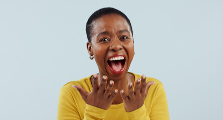 Excited black woman, portrait and face in surprise for winning, prize or celebration against a...