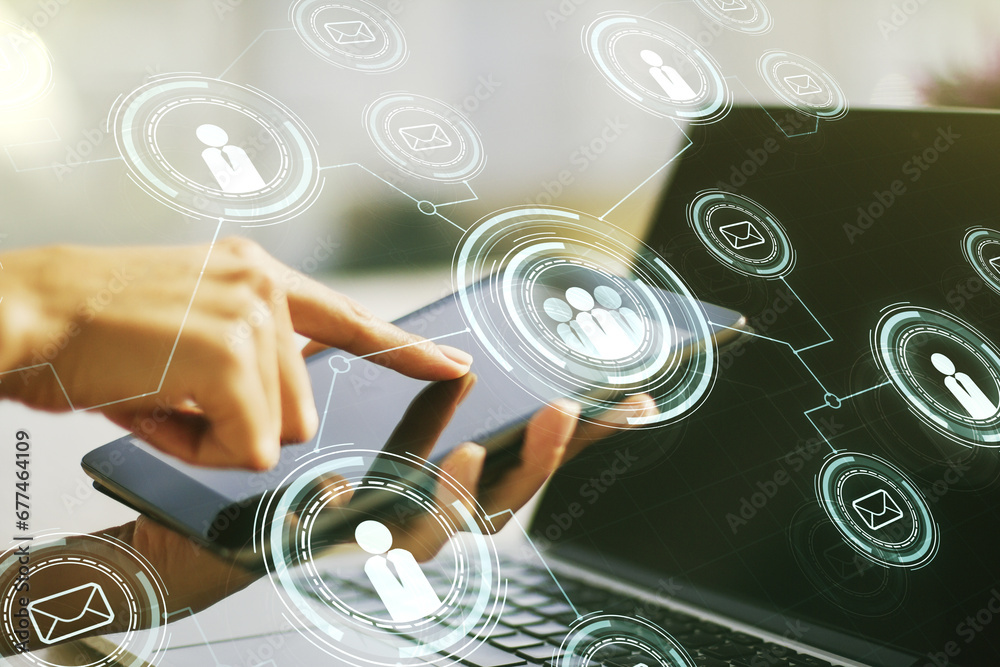 Poster double exposure of social network icons concept and hand working with a digital tablet on background