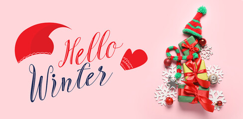 Christmas tree made of decorations and gifts on pink background. Hellow winter