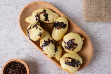 Kue cubit, a side snack from Jakarta, Indonesia. This cake got its name because the ripe cake was...