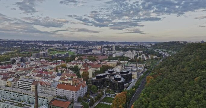 Prague Czechia Aerial v86 low drone flyover Karlin along the side of Vitkov hill towards Invalidovna neighborhood capturing veterans care facility complex - Shot with Mavic 3 Cine - November 2022