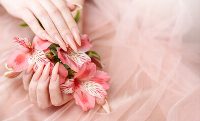 Elegant pastel pink natural manicure.