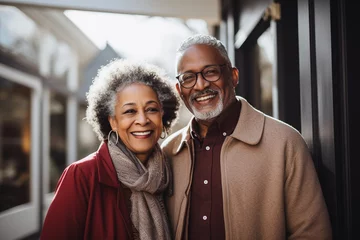 Fotobehang Healthy African American senior couple smiling happy and embracing together, love and relationship concept © Nuchylee