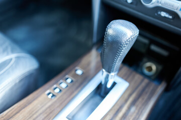 Close up of gear stick of a modern car. Selective focus