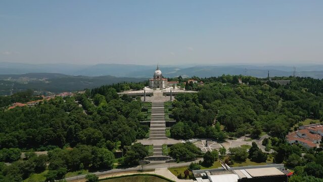 Aerial panoramic: Serene Sameiro Sanctuary in verdant Braga hills