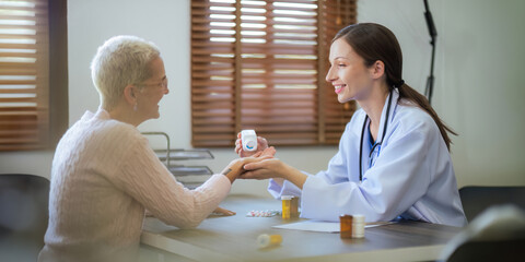 doctor discussion results or symptoms and gives Give advice about medicine to a senior women...