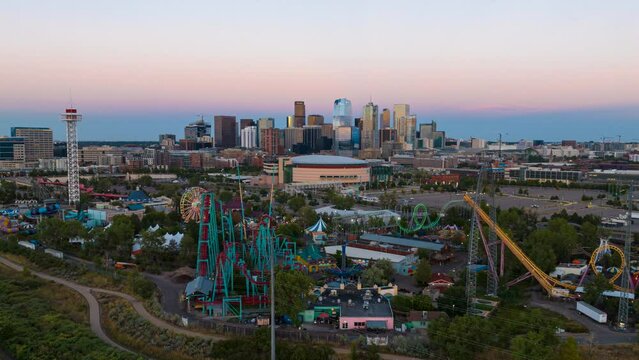 Aerial sunset hyperlapse toward Elitch Gardens theme park