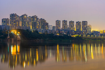 View of Chongqing skyline from Ciqikou Ancient Town during evening and night at Chongqing Yuzhong District , China : 23 October 2023