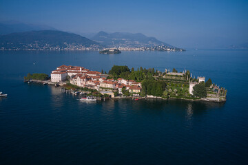 Panorama at sunset on Lake Maggiore top view. Aerial view of Isola Bella drone panoramic view. Borromean Islands, Lake Maggiore, Piedmont, Europe. Lake Maggiore, island, Isola Bella, Italy.