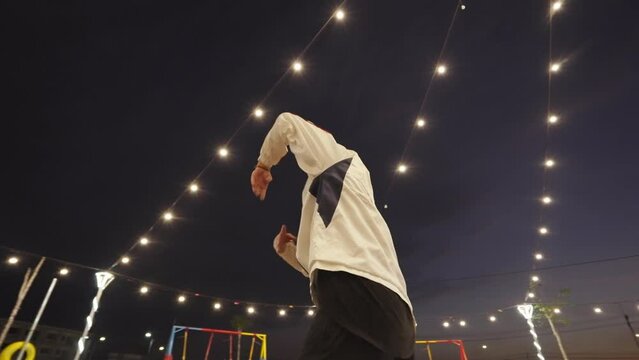 Breakdancing In Illuminated Park