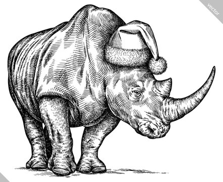 Vintage engraving isolated rhinoceros set dressed christmas illustration ink santa costume sketch. Africa background rhino silhouette new year hat art. Black and white hand drawn vector image