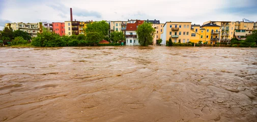 Foto op Plexiglas flood in the city water flooded the lower floors © luchschenF
