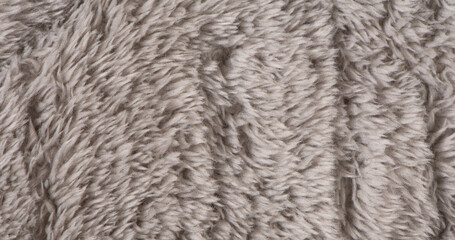 gray plush fabric texture background , background of soft fur warm material