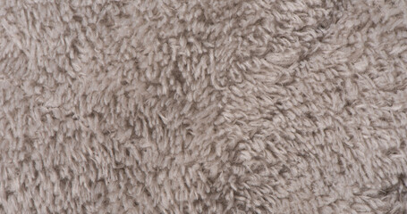 gray plush fabric texture background , background of soft fur warm material