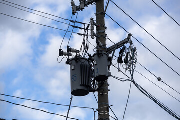 A lot of electric wires on a pole, electricity transmission in Japan