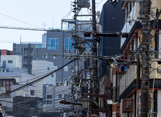 A lot of electric wires on a pole, electricity transmission in Japan