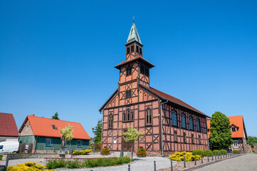 Former half-timbered evangelical church in Ujscie, Greater Poland Voivodeship, Poland - obrazy, fototapety, plakaty