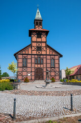 Former half-timbered evangelical church in Ujscie, Greater Poland Voivodeship, Poland - obrazy, fototapety, plakaty