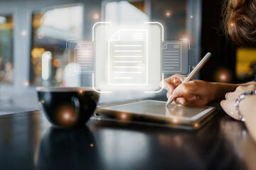 Unrecognizable Asian businesswoman digital signing a document on tablet screen. 