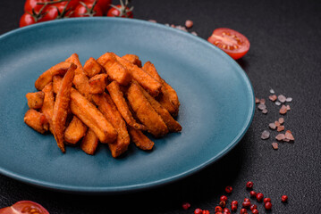 Delicious crispy sweet potato fries with salt, spices and herbs