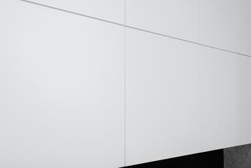 White minimalistic kitchen drawers, close-up