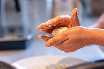 The process of making cheesecakes, cottage cheese fritter.