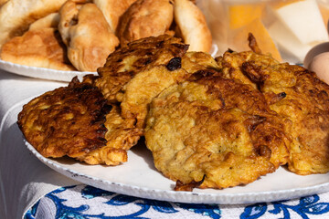fried pancakes or pancakes. on a plate on table. Traditional cuisine of Russia or Belarus.
