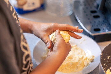 The process of making cheesecakes, cottage cheese fritter.