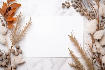 Minimal empty paper card mock up with dry leaves and wild flowers.