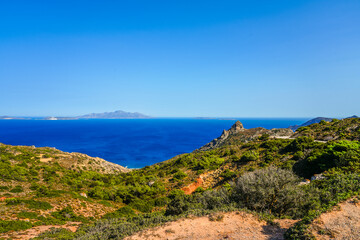 View of the landscape and the Mediterranean Sea from a mountain on the Greek island of Kos.	