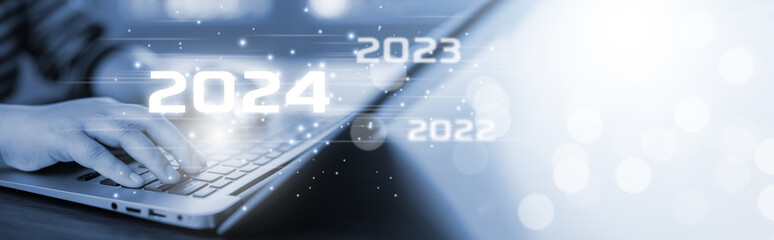 Businessman using laptop computer search 2024 trends,happy new year concept digital trends,industry...