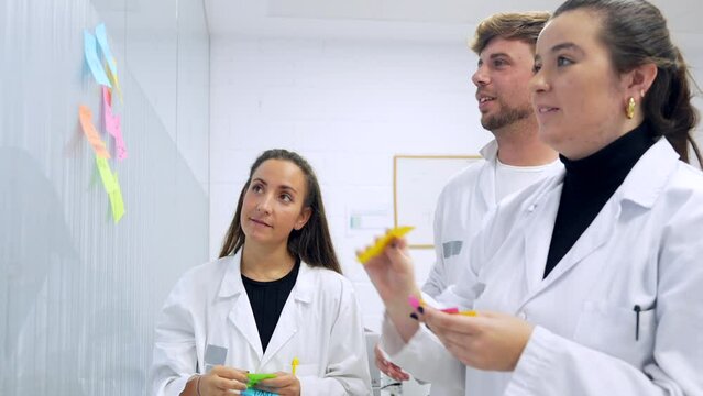 Scientist during a creative process in a cancer research lab
