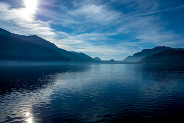 Lake Lugano with Sunlight and Mountain in Morcote, Ticino in Switzerland.