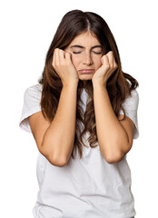 Young Caucasian woman in studio setting crying, unhappy with something, agony and confusion concept.