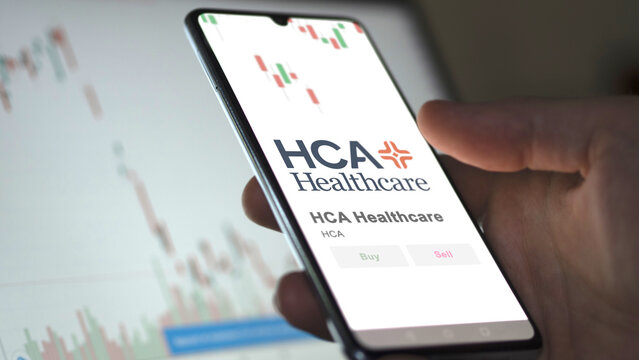 November 13th 2023.  Nashville, Tennessee. The logo of HCA Healthcare on the screen of an exchange. HCA Healthcare price stocks, $HCA on a device.