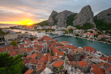 Romantic view of the panorama of the old town of Omis in Dalmatia,Croatia - 677565174