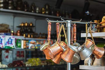 Copper coffee pots jezve (gezve, cezve, ibrik) at the street shop in Bodrum, Turkey (Turkiye)....