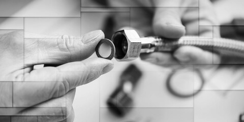 Plumber working on fittings, geometric pattern