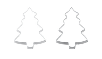 Cookie cutters of Christmas fir tree shape. Blank metal tree isolated on white background.