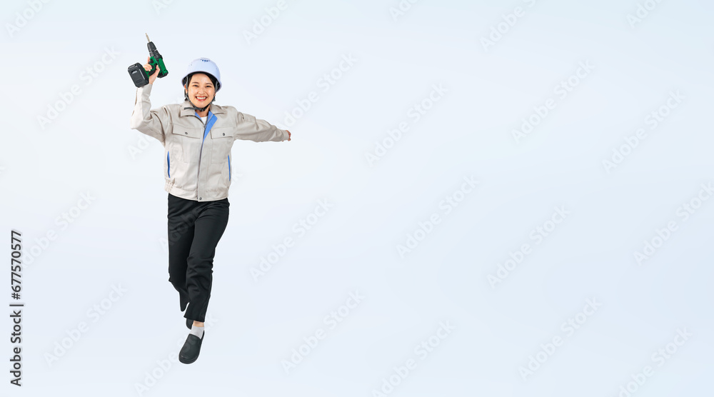 Poster ジャンプするヘルメットと作業服を着た女性　作業員　エンジニア　切り抜き全身写真（切り抜き背景透過pngも販売しております。作成者リンクから「png」で検索してください）