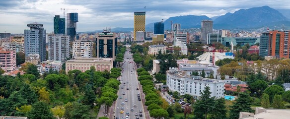 Aerial image of Tirana Skyline photographed from a distance - obrazy, fototapety, plakaty