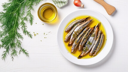 Fototapeta premium Anchovies marinated in olive oil and cooked at low temperature on a white plate.