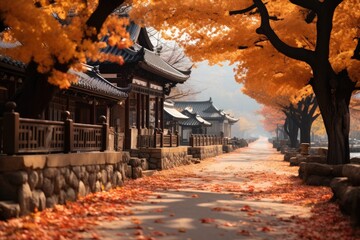 The ground is covered with golden maple leaves near the temple, autumn.
